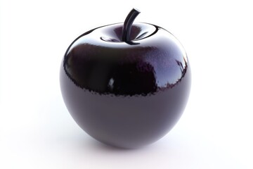 Obraz premium A striking, glossy black apple sits against a bright white backdrop, a study in minimalist design and food photography.