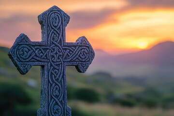 Celtic cross with intricate carvings stands against a beautiful sunset landscape, symbolizing faith and heritage.