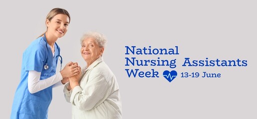 Senior woman with nurse holding hands on grey background. Happy National Nursing Assistants Week