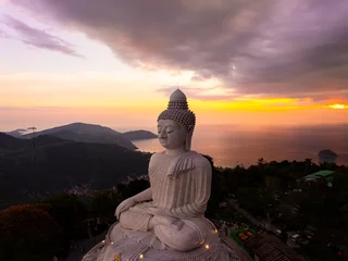 Fotobehang Boeddha Vesak day background concept of Big buddha over high mountain in Phuket thailand Aerial view drone shot  © Panya