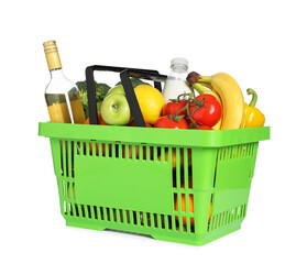 Shopping basket with different food products isolated on white