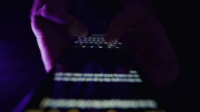 Digital Writing On Smartphone In Neon Purple Light