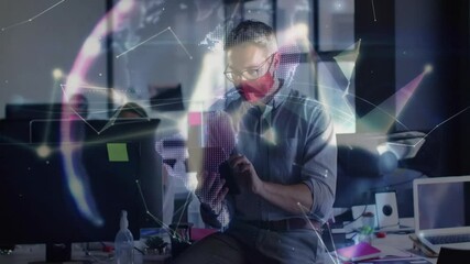 Man using tablet in modern tech office, displaying rotating digital globe with network data - Powered by Adobe