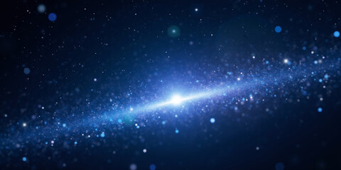 Fototapeta premium A view of a bright galaxy with many stars and a dark blue background