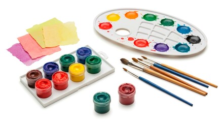 A colorful assortment of paints brushes palette and paper on a white background ready for painting
