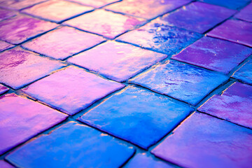 Vibrant purple and blue square tiles, wet pavement texture, close-up shot, abstract background.