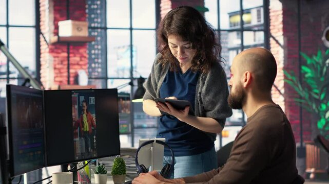 Man and woman collaborate on content creation for the media industry, analyzing data and insights, editing video footage and adjusting branding elements. AI powered. Camera B.