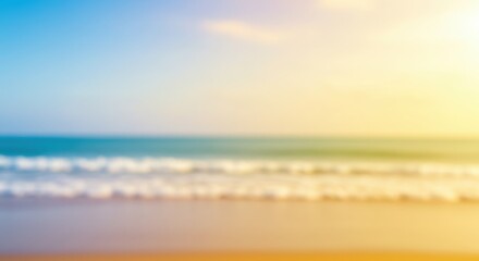 Obraz premium Blurred tropical beach scene with golden sand, blue ocean, and sunny sky. Summer vacation background. Defocused coastal landscape for relaxation concept and travel advertisement.