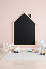 A charming playroom features a chalkboard house against a soft pink wall.