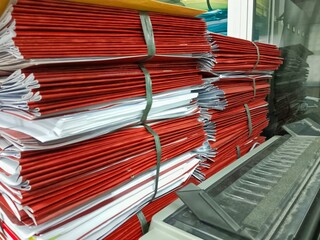 Stacks of Documents Tied Together in Office