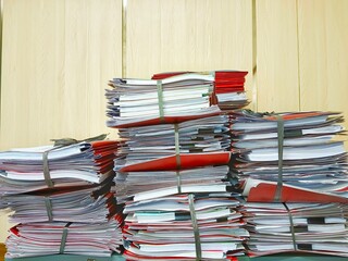 Stacked Document Files Bundled with Bands in Office