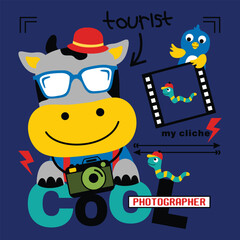 Cool cow tourist photographer with glasses and camera, capturing moments with his bird friend in a fun, vibrant design for children's illustration.
