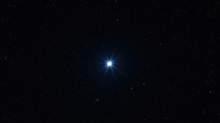 Fototapeta premium A bright star shines among countless smaller stars in the vast, dark night sky.