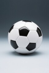 Fototapeta premium a close up of a soccer ball on a white surface