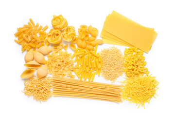 Composition with different types of raw pasta isolated on white background