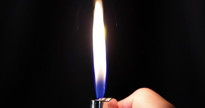 Slow Motion Gas Lighter Ignition in Darkness 