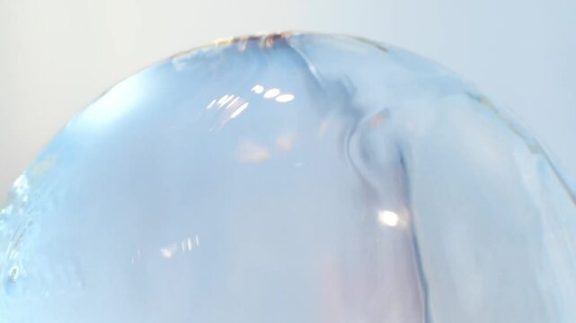 Golden essence balls gather into flowers, water-like essence hydrates, activates cells to penetrate the skin, cosmetic essence molecules are used in creams, facial serums, hair care,essential oils.3d.