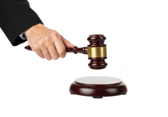 Hand holding gavel above sounding block isolated on transparent background