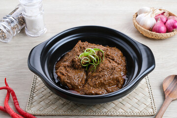 Rendang Daging Sapi, traditional food from Padang, Indonesia. Beef stew with spices, herbs and coconut milk
