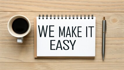 Modern wealth savings and financial growth. Notebook with the phrase "We make it easy," a coffee cup, and a pen on a wooden table.
