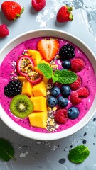 Colorful Smoothie Bowls with Various Sliced Fresh Fruits in a Vibrant Top-Down Presentation