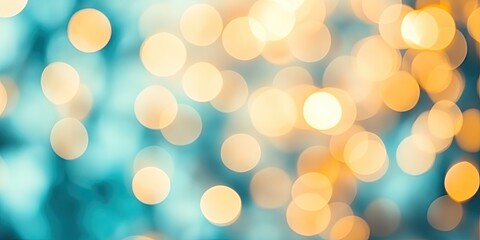 Obraz premium Abstract Teal and Gold Bokeh Background: Festive Sparkling Lights Blurred Texture for Holiday Designs