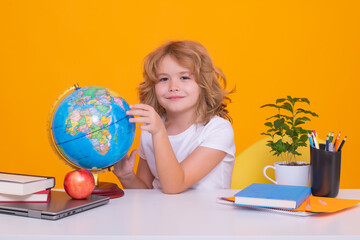 Nerd school kid isolated on studio background. Clever child from elementary school with book. Smart genius intelligence kid ready to learn. Hard study.