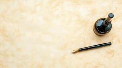 Elegant fountain pen and inkwell on textured paper background