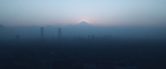 Misty Cityscape Sunrise with Mountain Peak