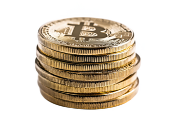 A close up shot of a stack of bitcoin coins with a golden color and a black letter b on top coin