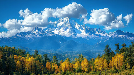 Majestic Snowcapped Mountain Peak under Blue Sky with Autumn Foliage