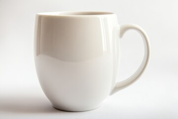Obraz premium A close-up of a blank coffee mug, slightly tilted to reveal the handle, smooth surface, high-quality lighting, soft shadows, clean white background