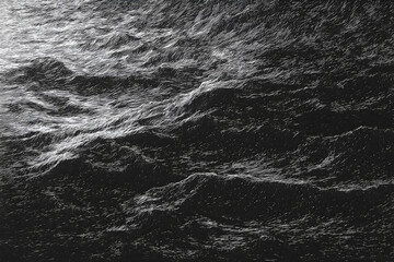 Fototapeta premium Abstract depiction of turbulent water surface in grayscale.