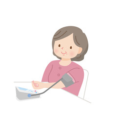 血圧を測るふくよかなミドル女性