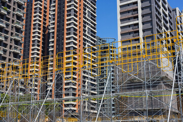 Construction site with workers tools and machines