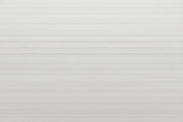 White textured wall with horizontal lines  suitable for backgrounds, website design, blog headers, social media posts, and graphic design projects.