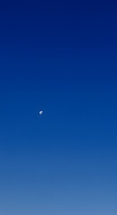 Abstract Photo Of The Vivid Blue Sky Featuring A Small White Cloud And Sunlight