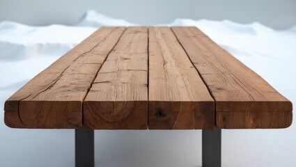 Standalone wooden table over a white surface
