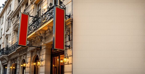 Hotel facade with blank red vertical signboard, warm lighting, classic architectural style, beige background wall, concept of travel and accommodation, Ai generative
