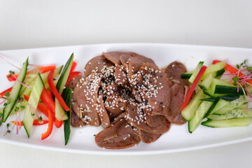 Liver cucumber peppers Tasty fried chicken liver with onion and parsley isolated on white