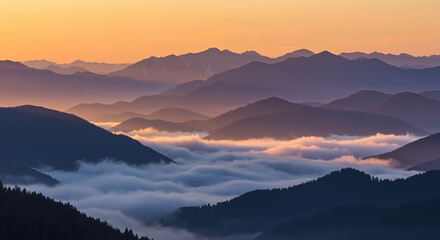Obraz premium Ethereal mountain landscape at sunset with layers of silhouetted peaks and valleys filled with sea of clouds. Atmospheric perspective. Natural wonder. Adventure tourism, landscape, meditation retreat