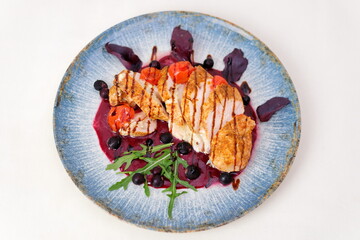 Berry sauce Delicious summer salad, chicken meat, fresh pears, ricotta cheese, red onion, nuts, spinach and arugula, white background, top view