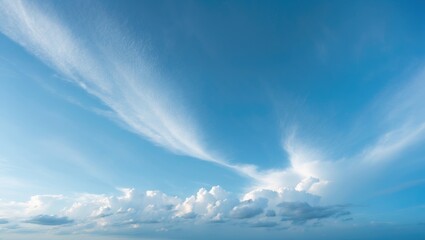 Stunning scene of white clouds beneath clear blue sky