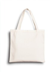 Blank white canvas tote bag hanging or laid flat, isolated on white or transparent background, great for mockups and eco-product designs, soft natural shadows.