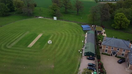 Pre-Match Team Talk – Drone Orbit Around Rural Cricket Squad - Powered by Adobe