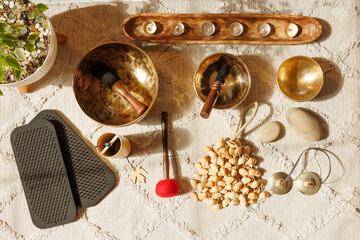 Top view of meditation and sound healing objects used for relaxation and mindfulness practice.