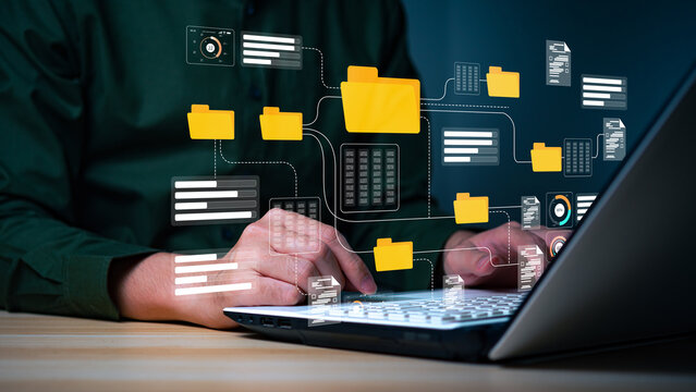 Conceptual image representing a digital data management system, network, or cloud computing service, with holographic documents and a folder displayed above a hand. - Powered by Adobe