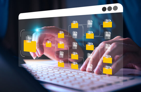 Conceptual image representing a digital data management system, network, or cloud computing service, with holographic documents and a folder displayed above a hand.