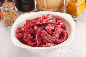 Raw beef meat - sliced strips