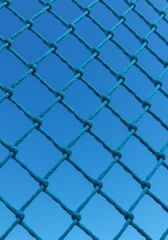 Fototapeta premium Blue Net Against Clear Sky Background in an Outdoor Setting